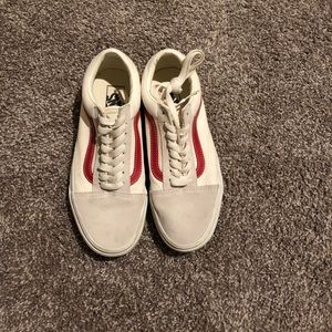 Tan vans with red stripes
